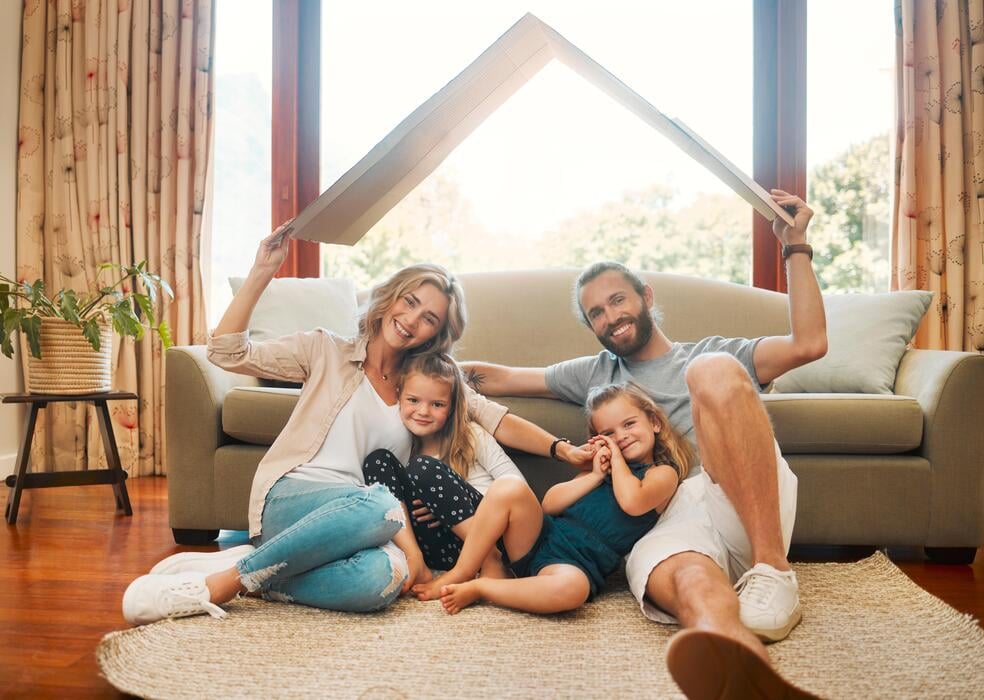 Happy family feeling relieved after securing a personal loan